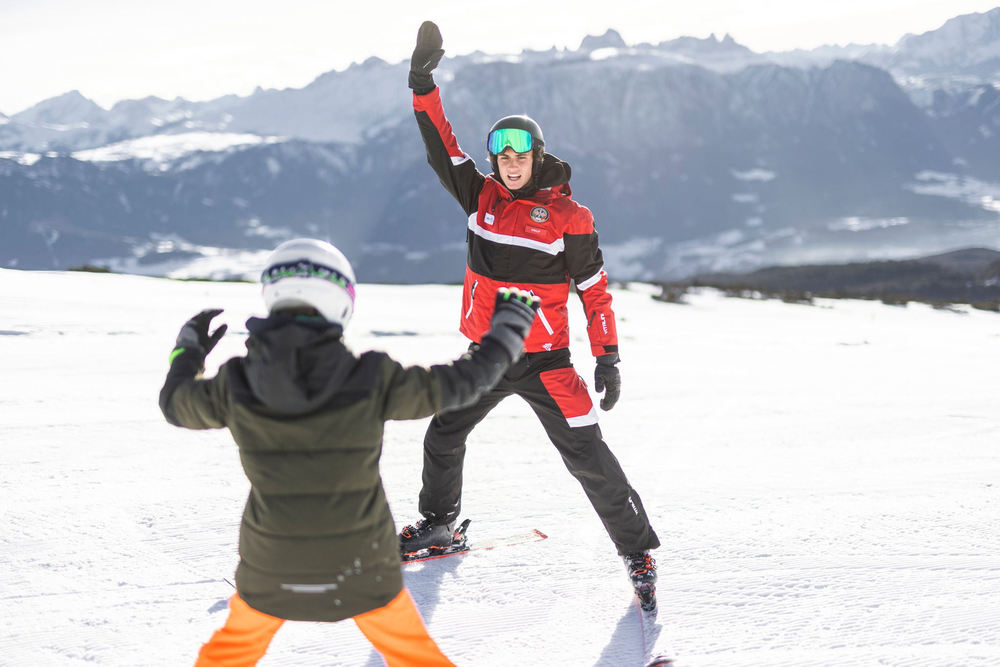 Skilehrer bei Skistunde mit Kind am Rittner Horn