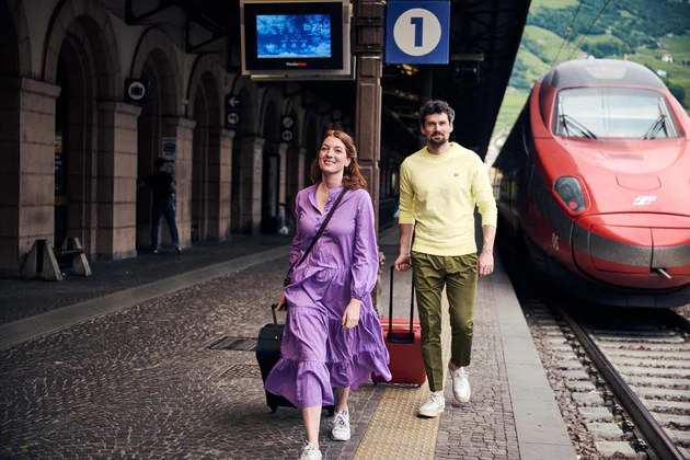 Two people at the train station