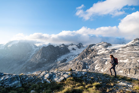 A man is hiking on the Ortler High Mountain Trail