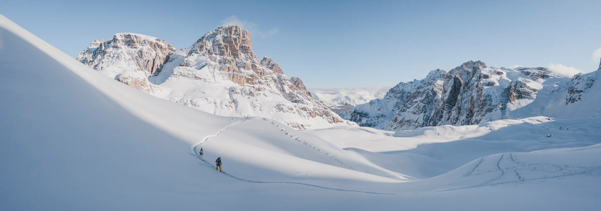 Two people hiking in the Dolomites