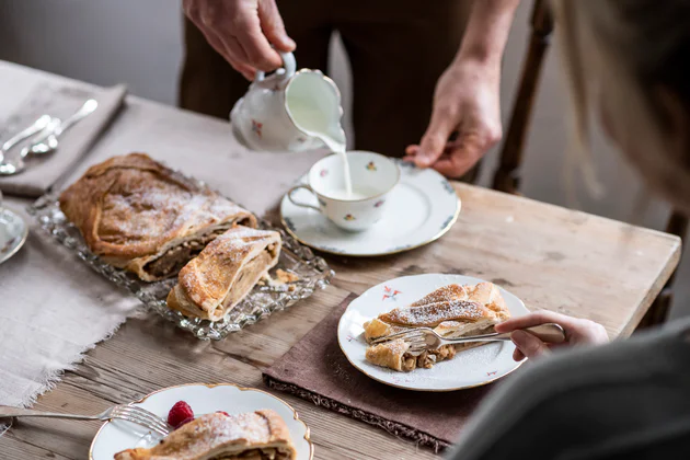 Table set with apple strudel