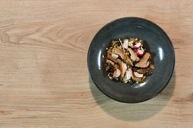 Cauliflower couscous with rye sourdough crisps and radishes