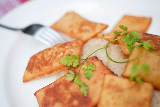 Deep-fried potato dumplings with sauerkraut