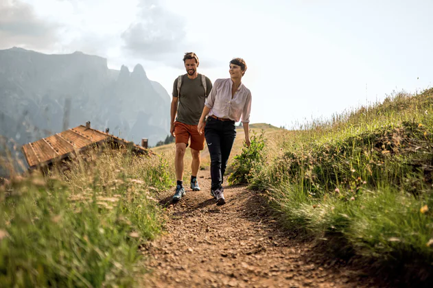 Two people hiking in the mountains