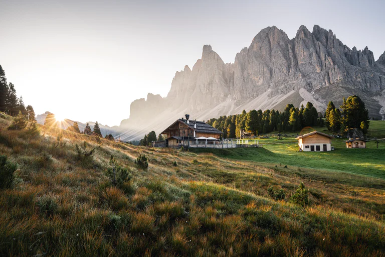 A hut and a stable at the foot of the Geisler mountains in the Villnösstal region.