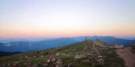Sunset on the summit of the stone cairns.