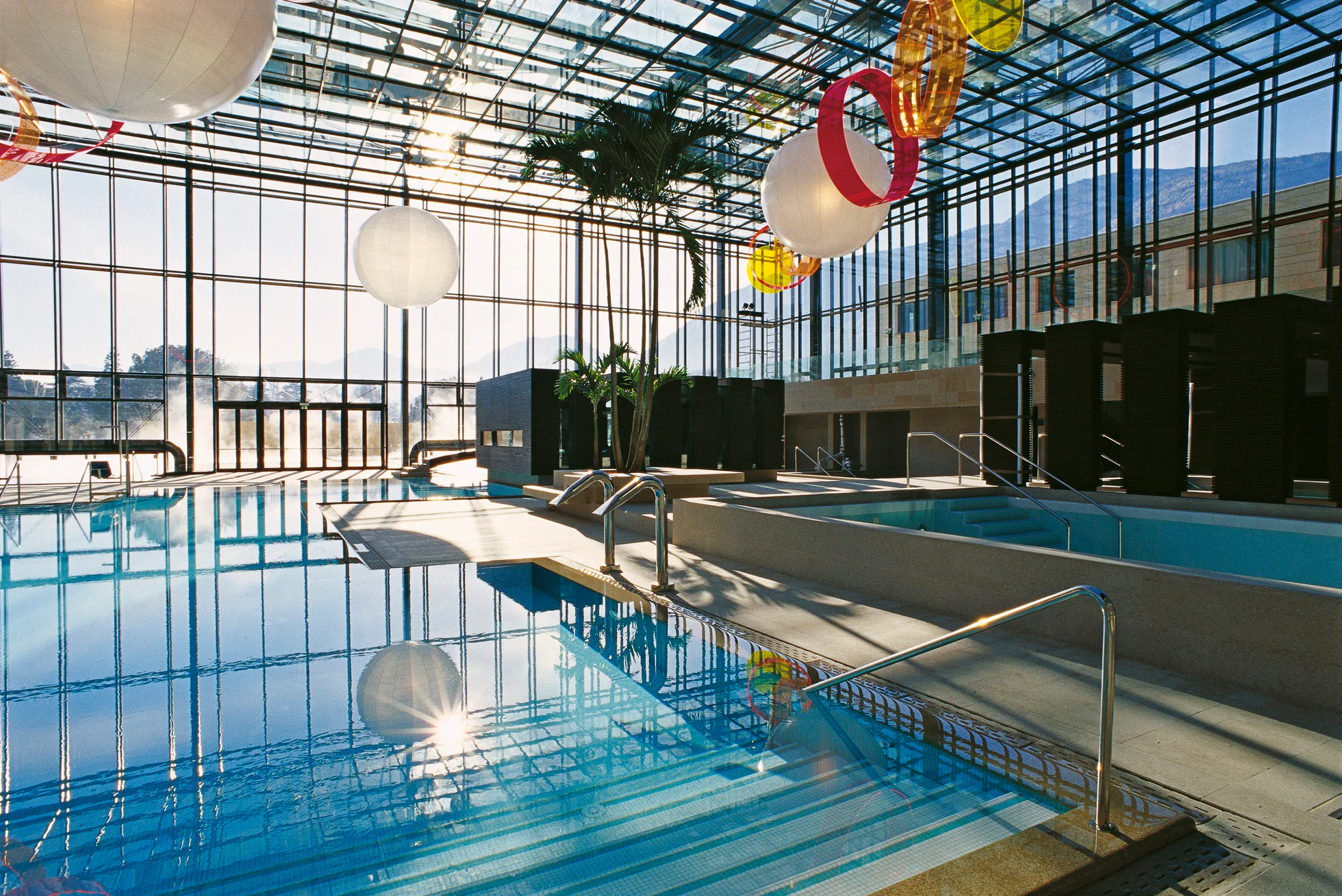 View of the outdoor swimming pools at Terme Merano. 