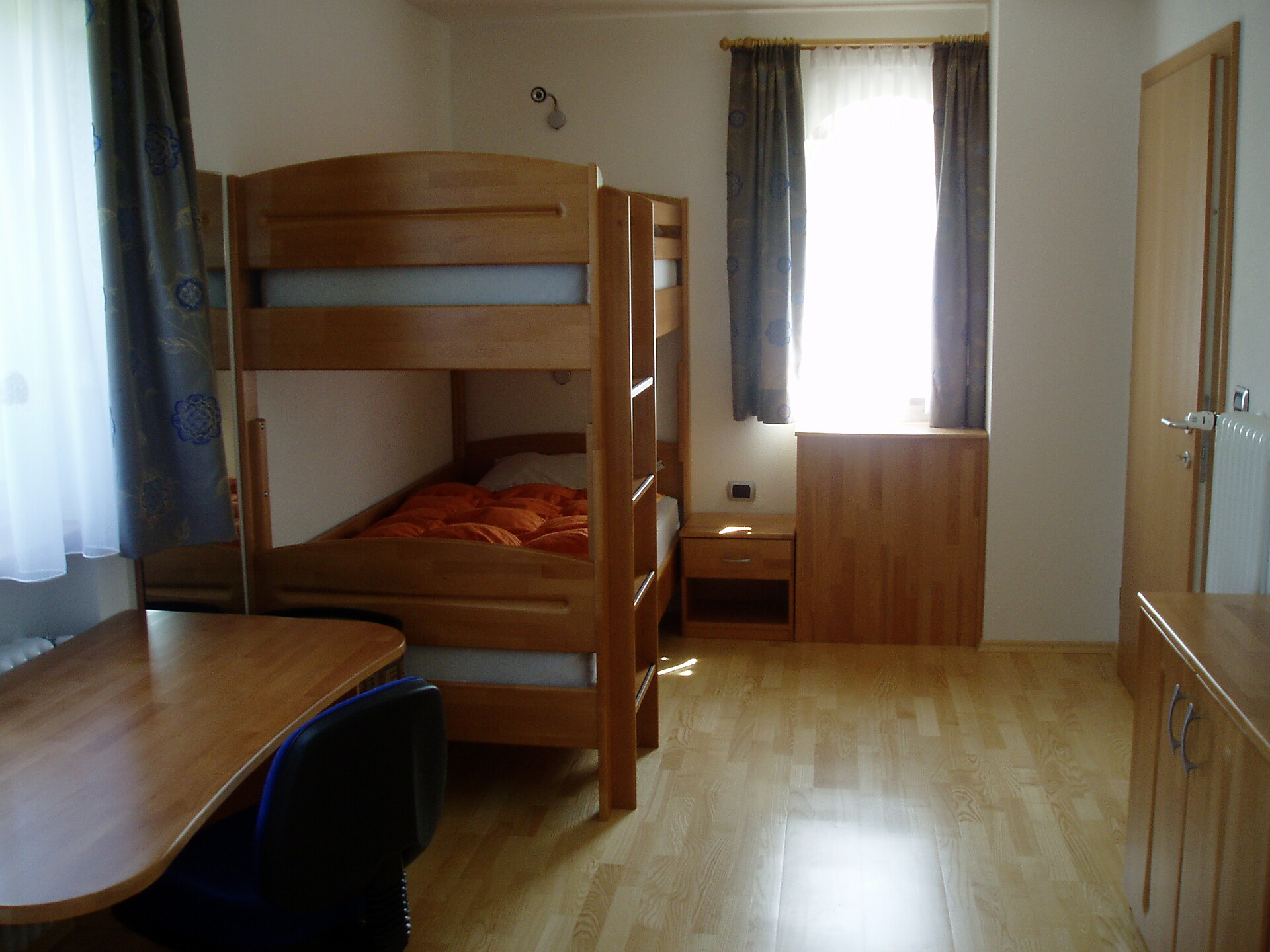 Zimmer mit drei Betten
