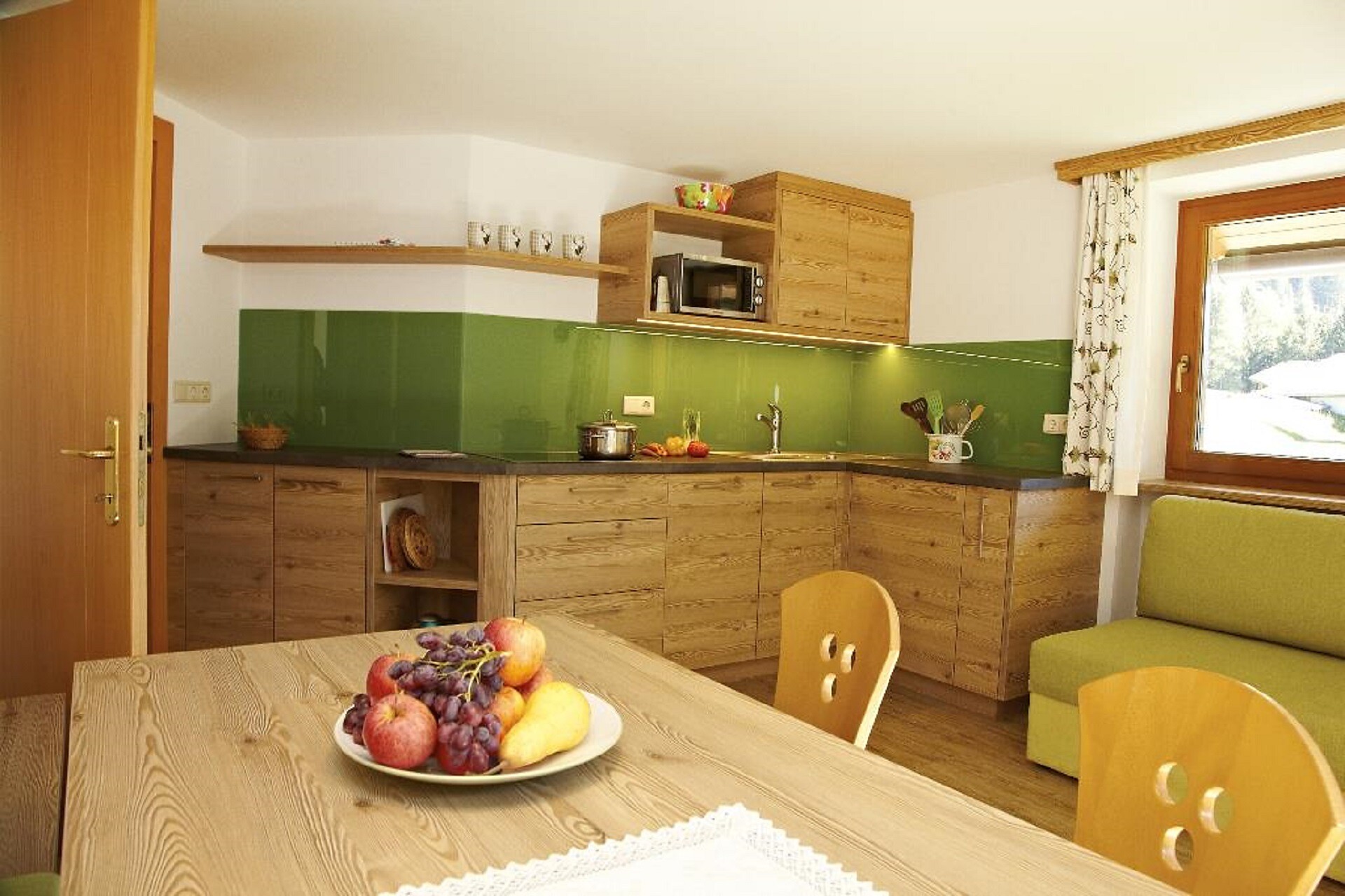 living room with cooking area app. LINA