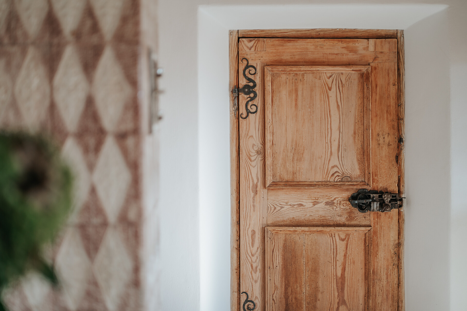historic door with tiled stove
