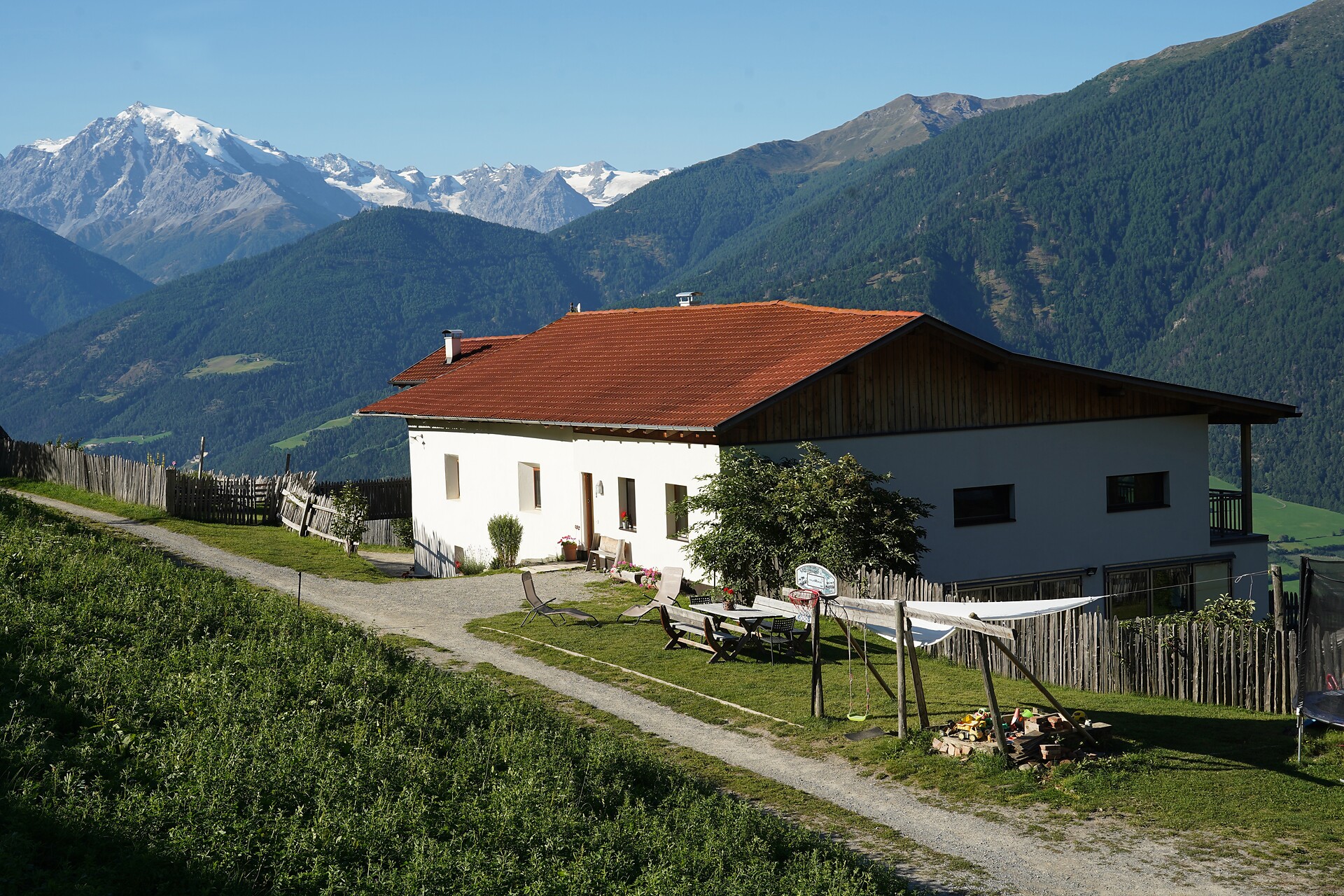 Sunbathing lawn with playground for our guests