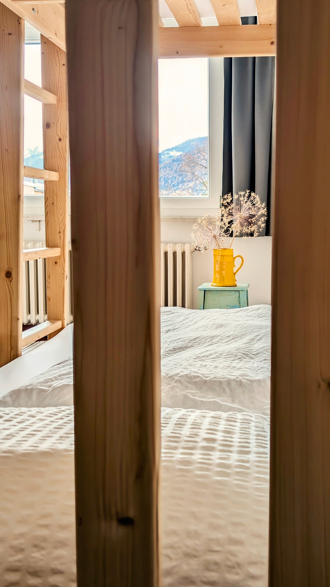 The photo captures a charming detail from a twin room at the FinKa in Mals, in Upper Vinschgau (Sout