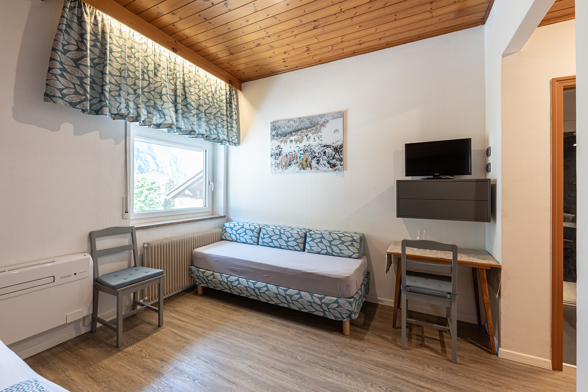 Camera matrimoniale con letto aggiunto