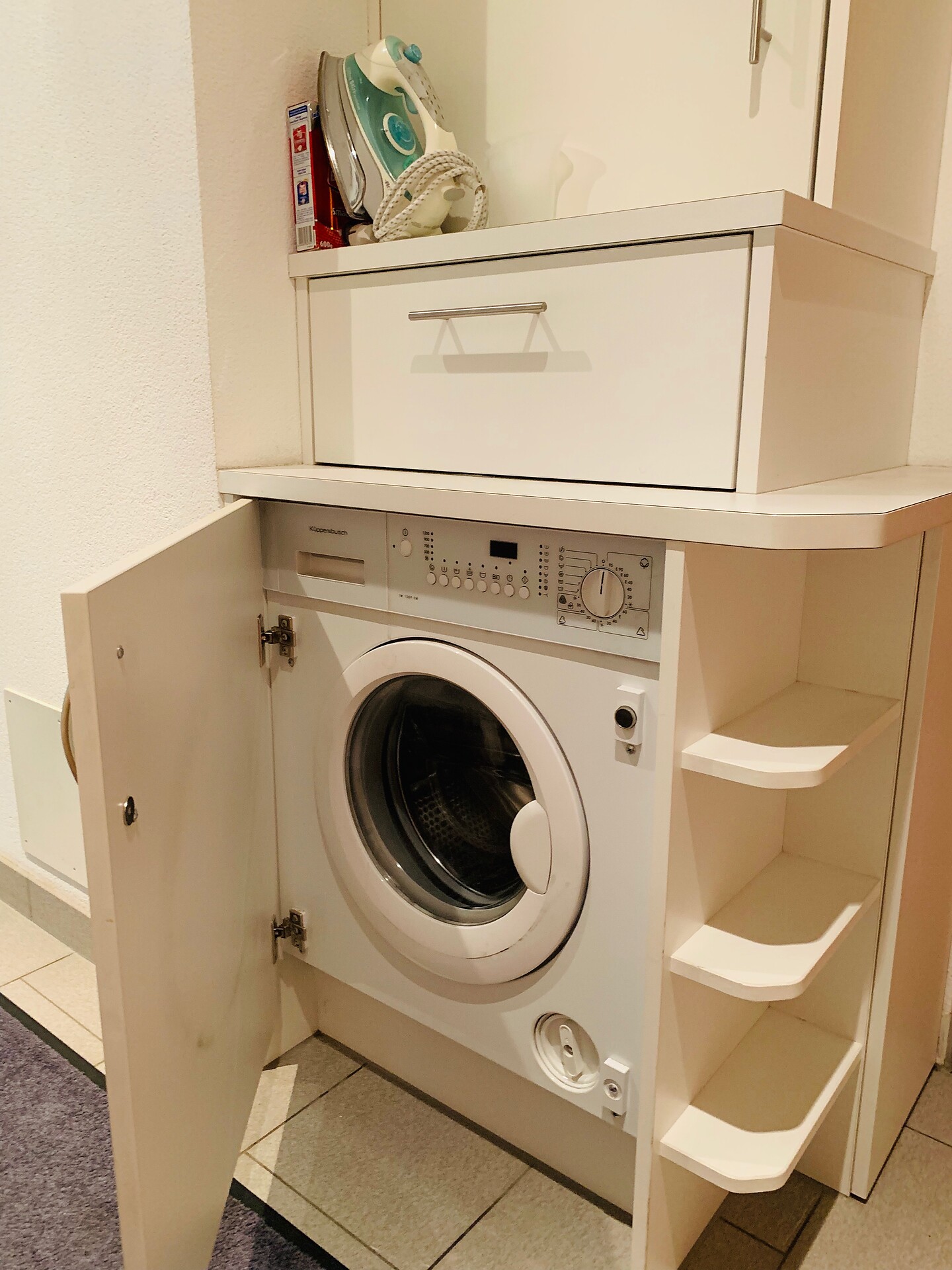 washing machine in the corridor for common use