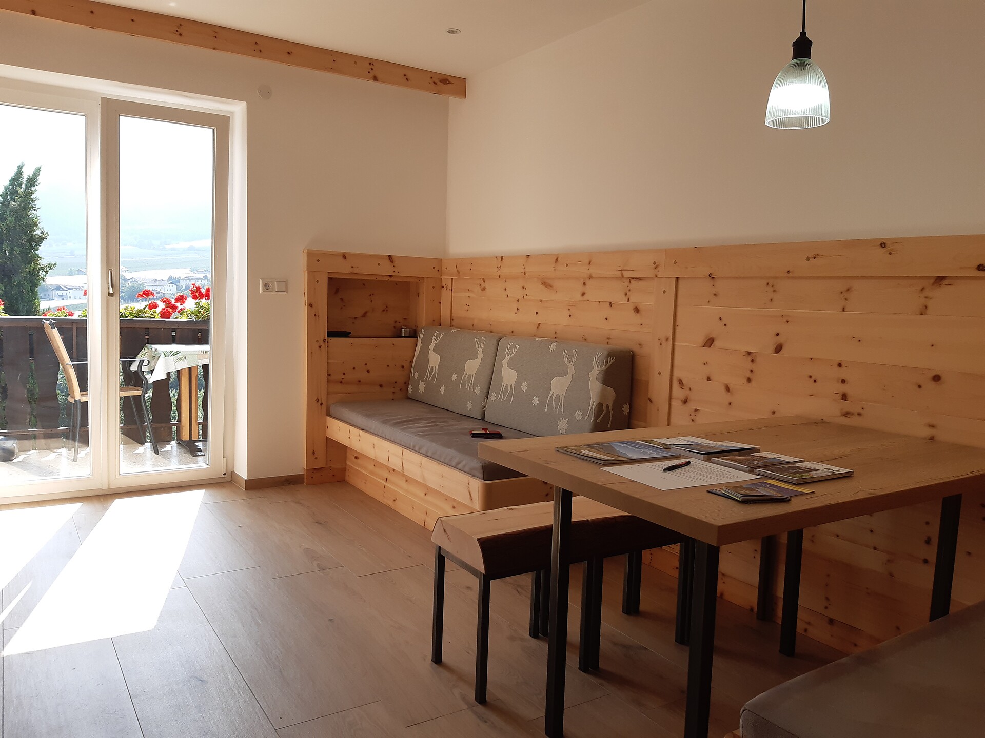 Living room in solid pine wood with sofa