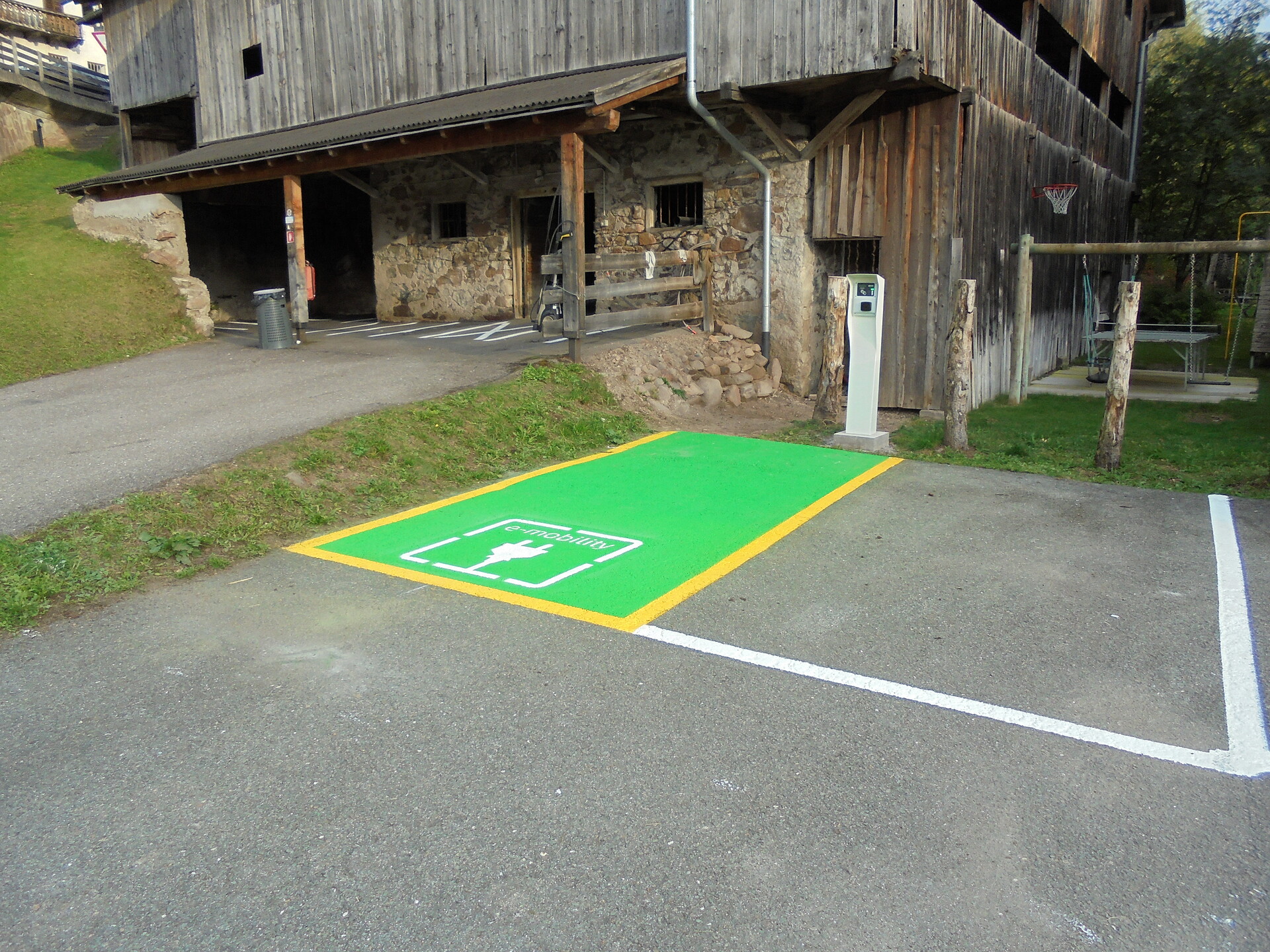 Parking area with electric charging station
