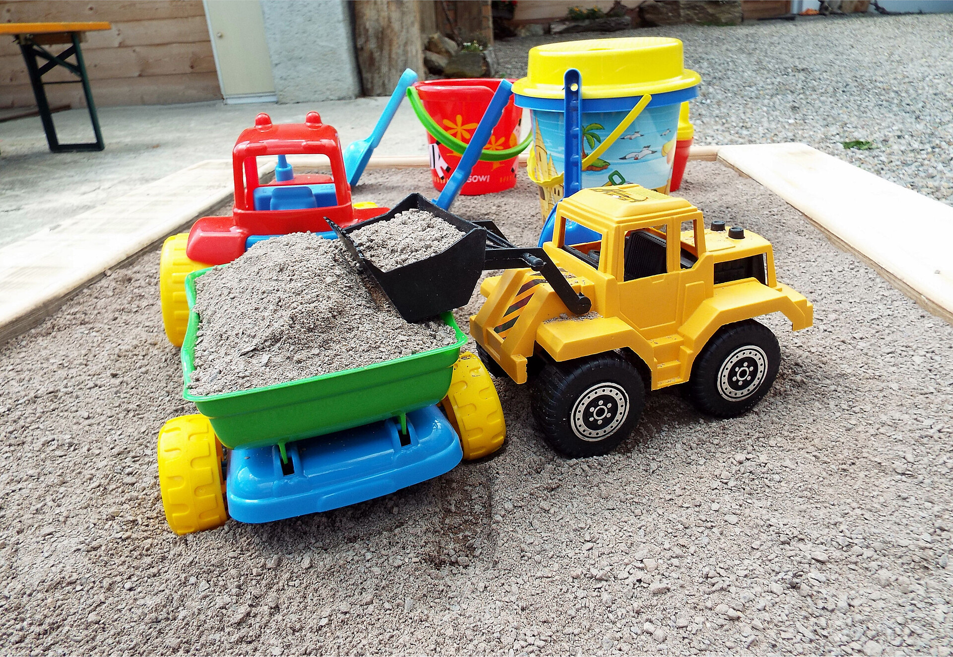 Sandkasten für die Kinder