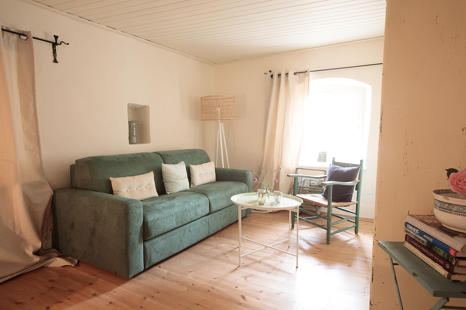 large room with a cosy corner to relax in