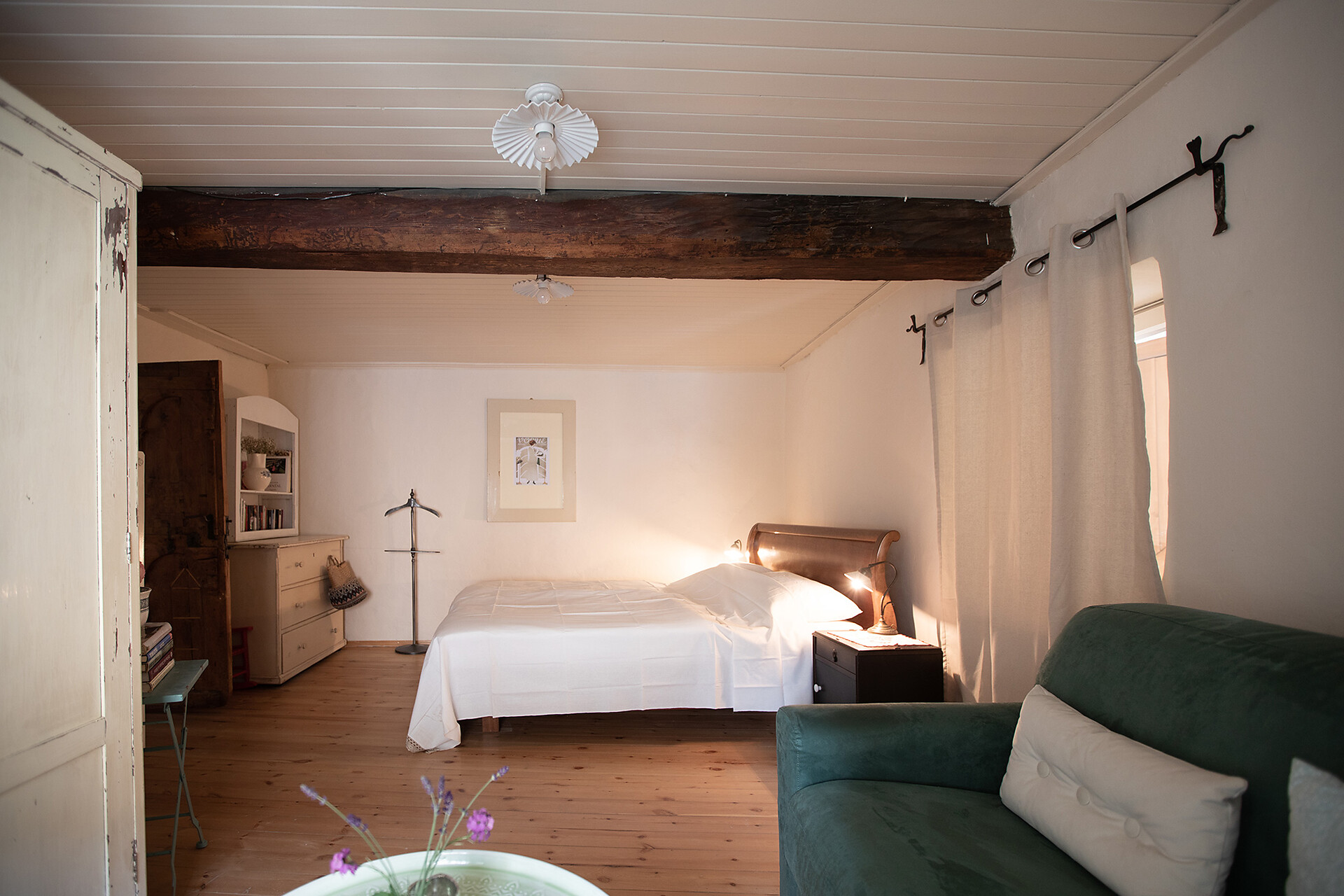 large room with a cosy corner to relax in
