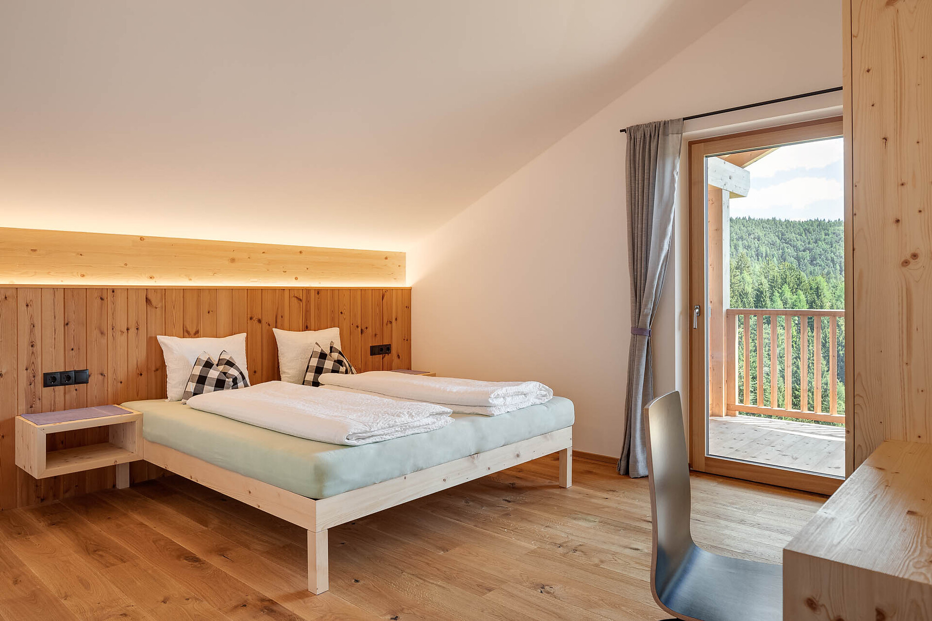 hugh bedroom with balcony access