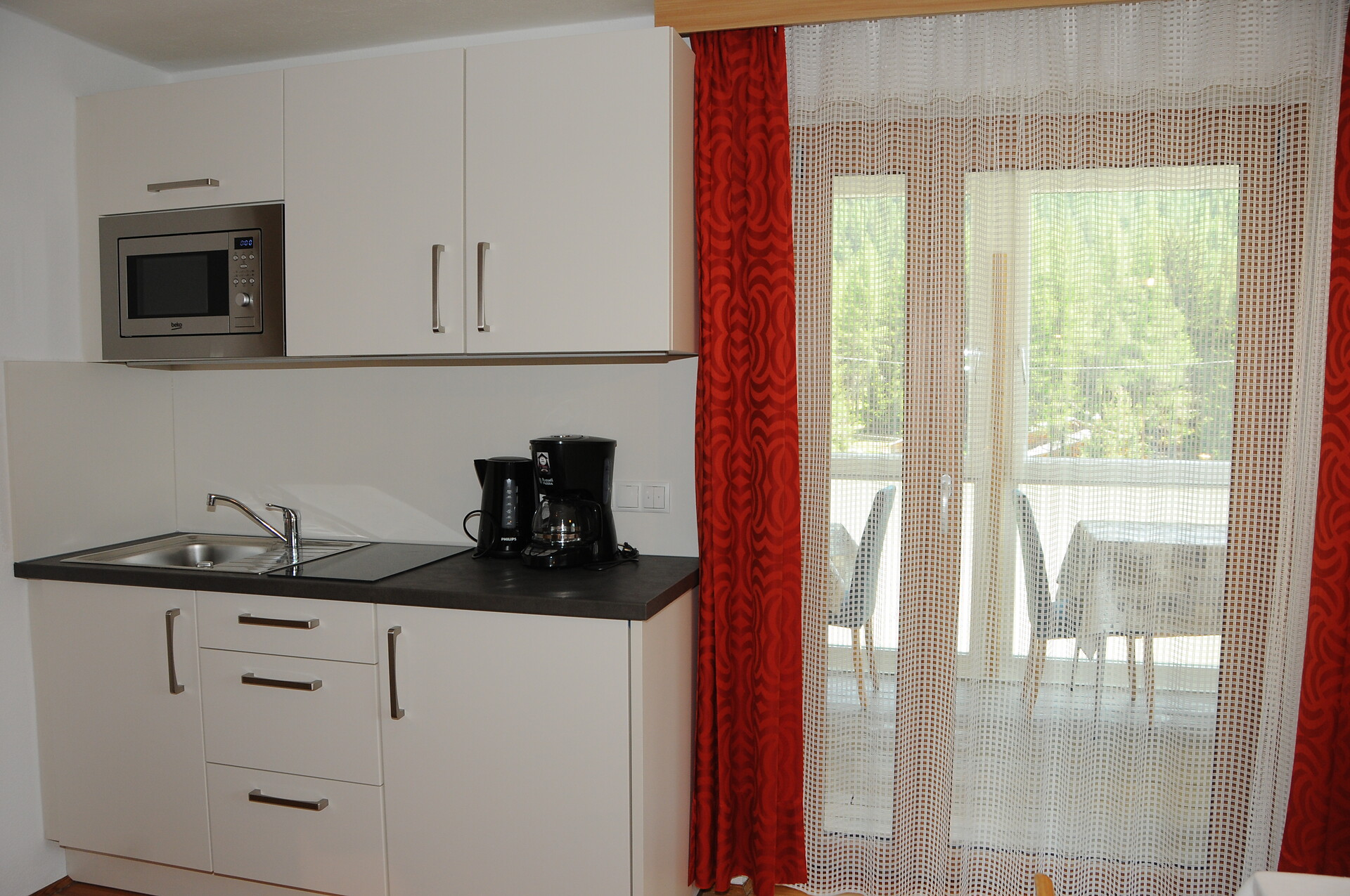 Doppelzimmer mit Küchenzeile und Wintergarten