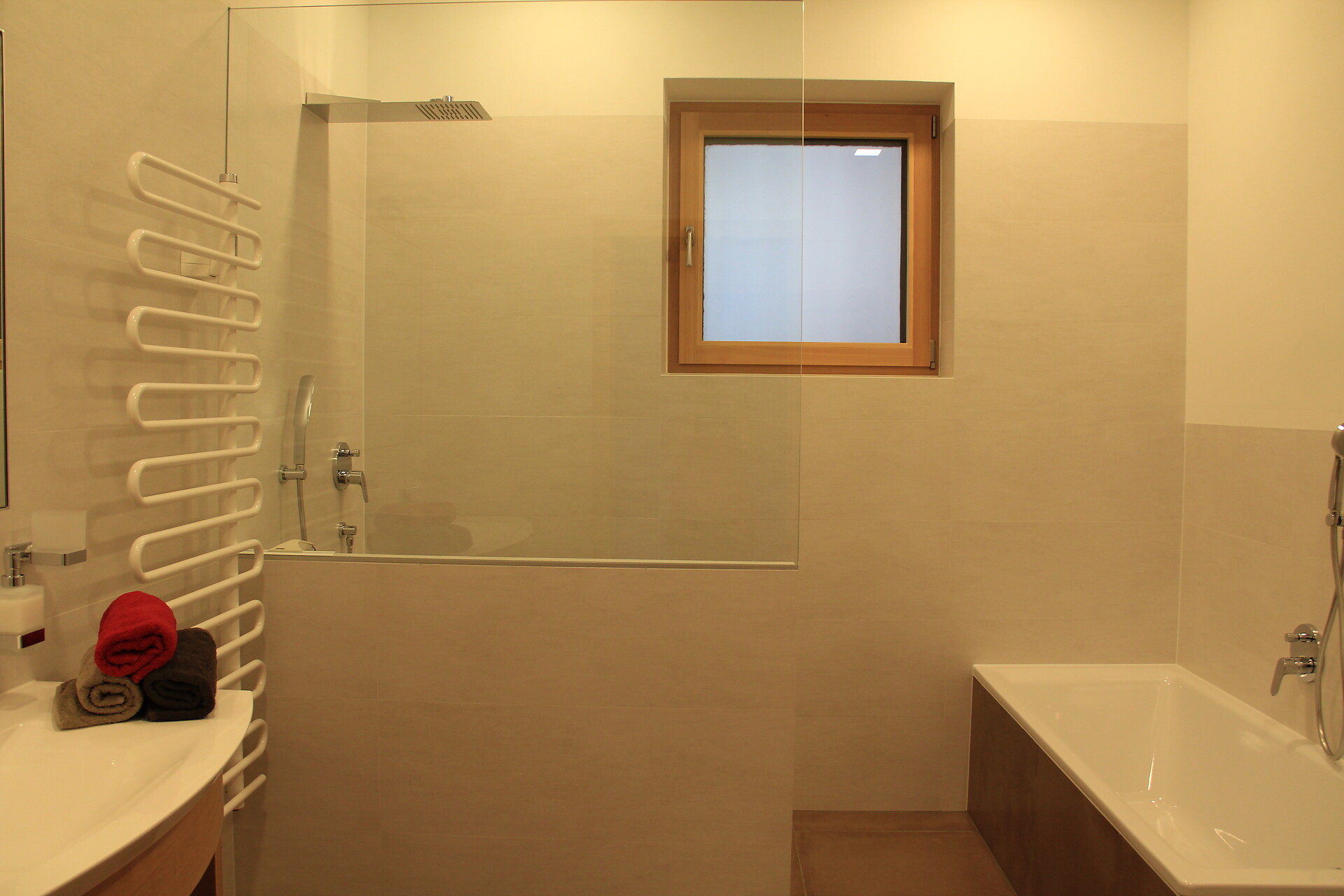 Bathroom with shower and bathtub