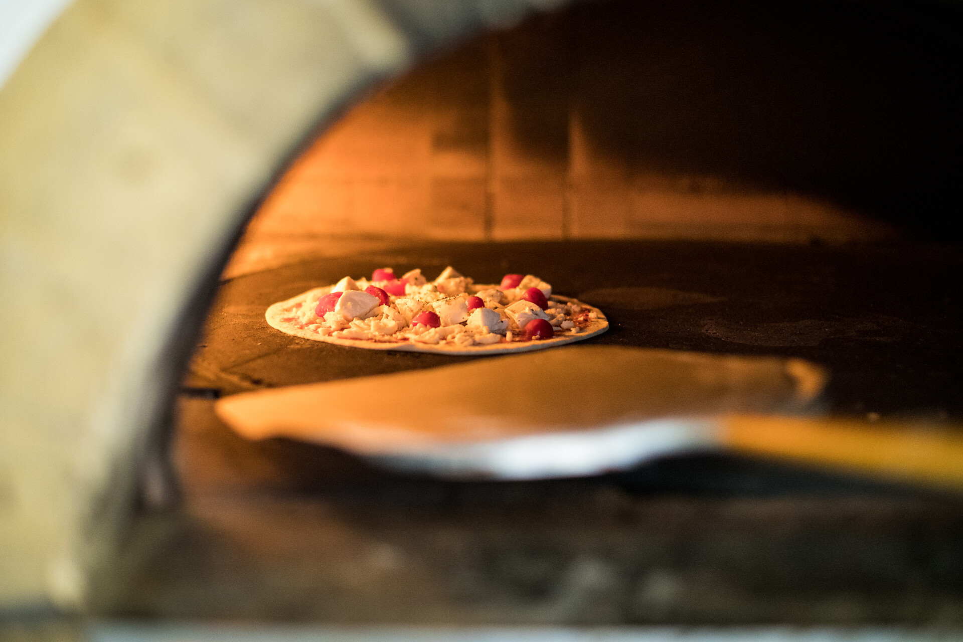 Pizza aus dem Holzofen
