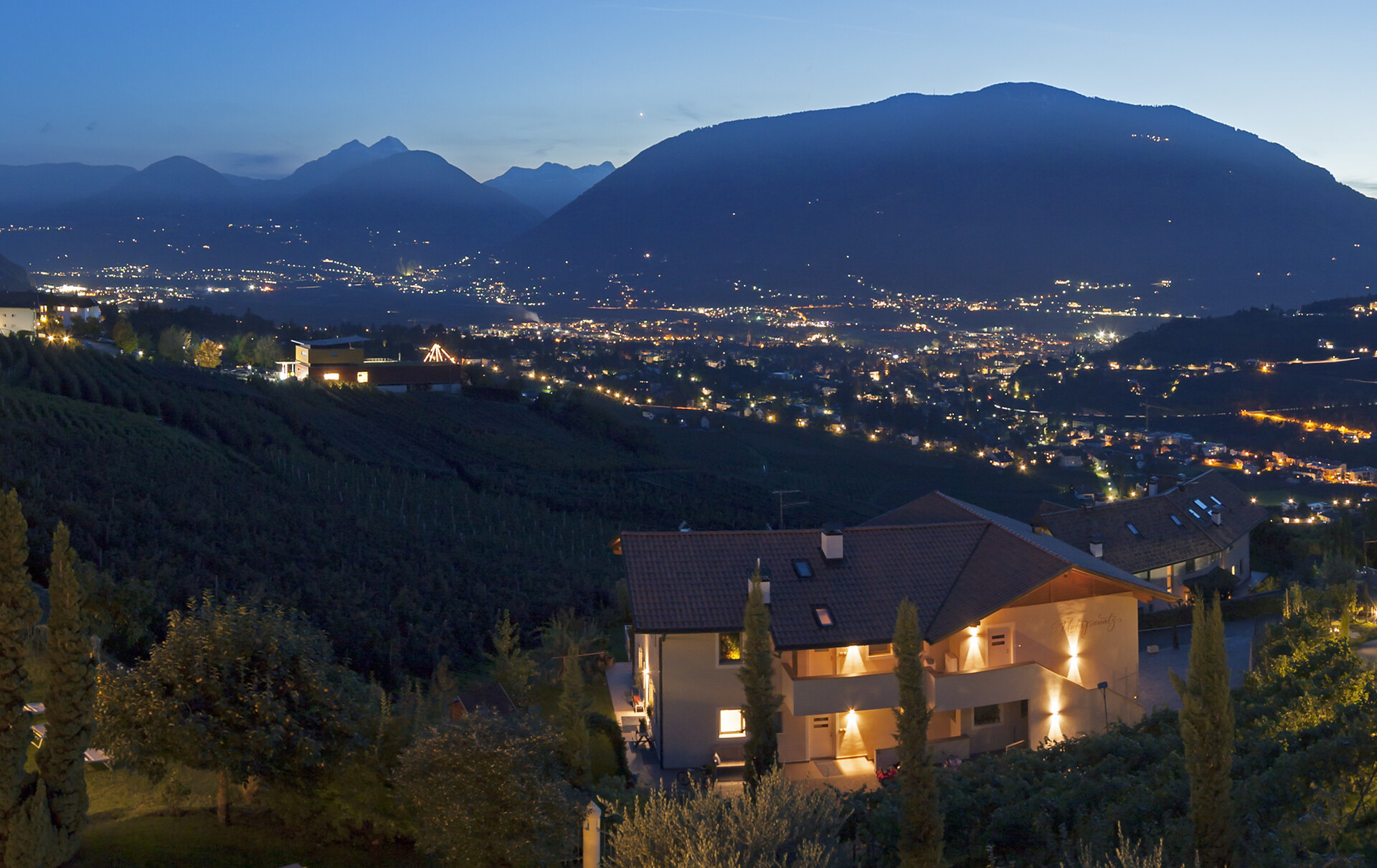 Evening garden with view of the city Merano