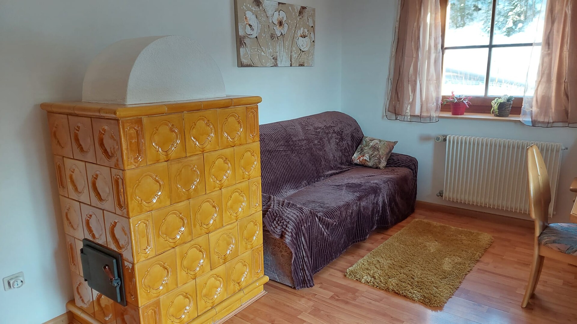 living room/ tiled stove