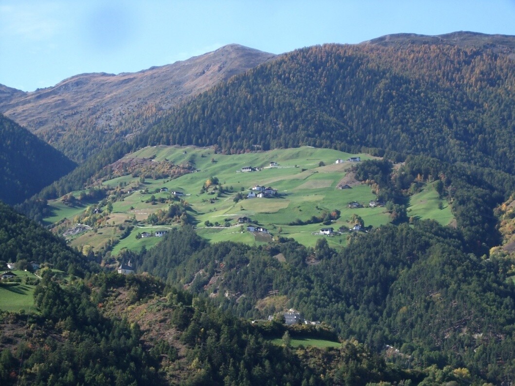 Mountain farms of Montechiaro with the castle ruin