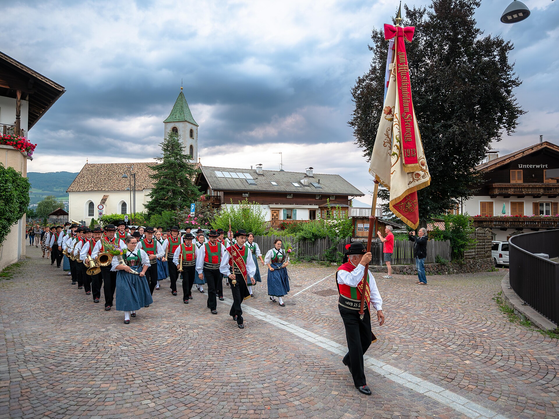 Festa del Patrono di Collepietra 2026 – Tradizione, musica e sapori - Regione dolomitica Val d'Ega - #1 - suedtirol.info