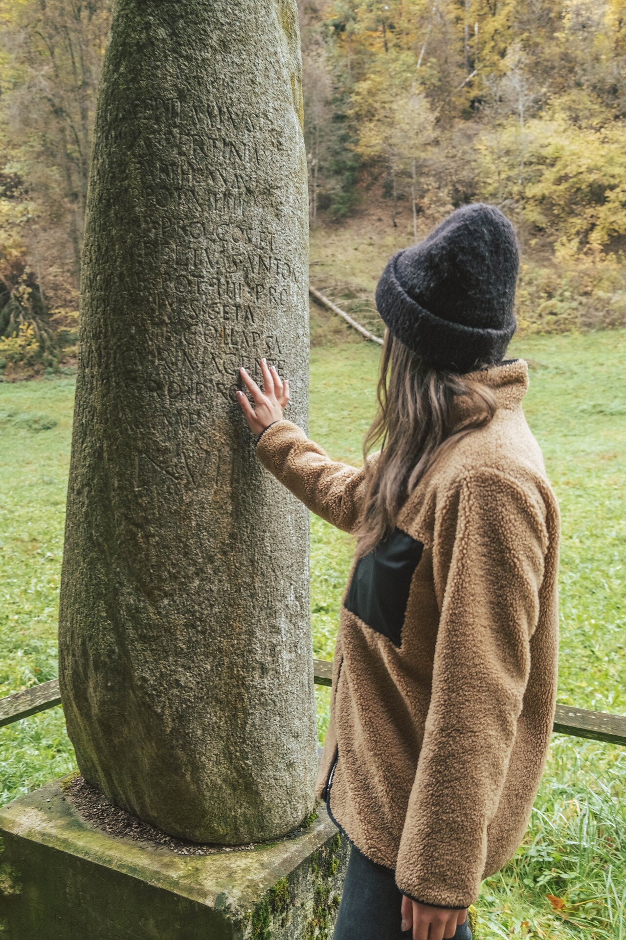 Hiker at the Roman milestone