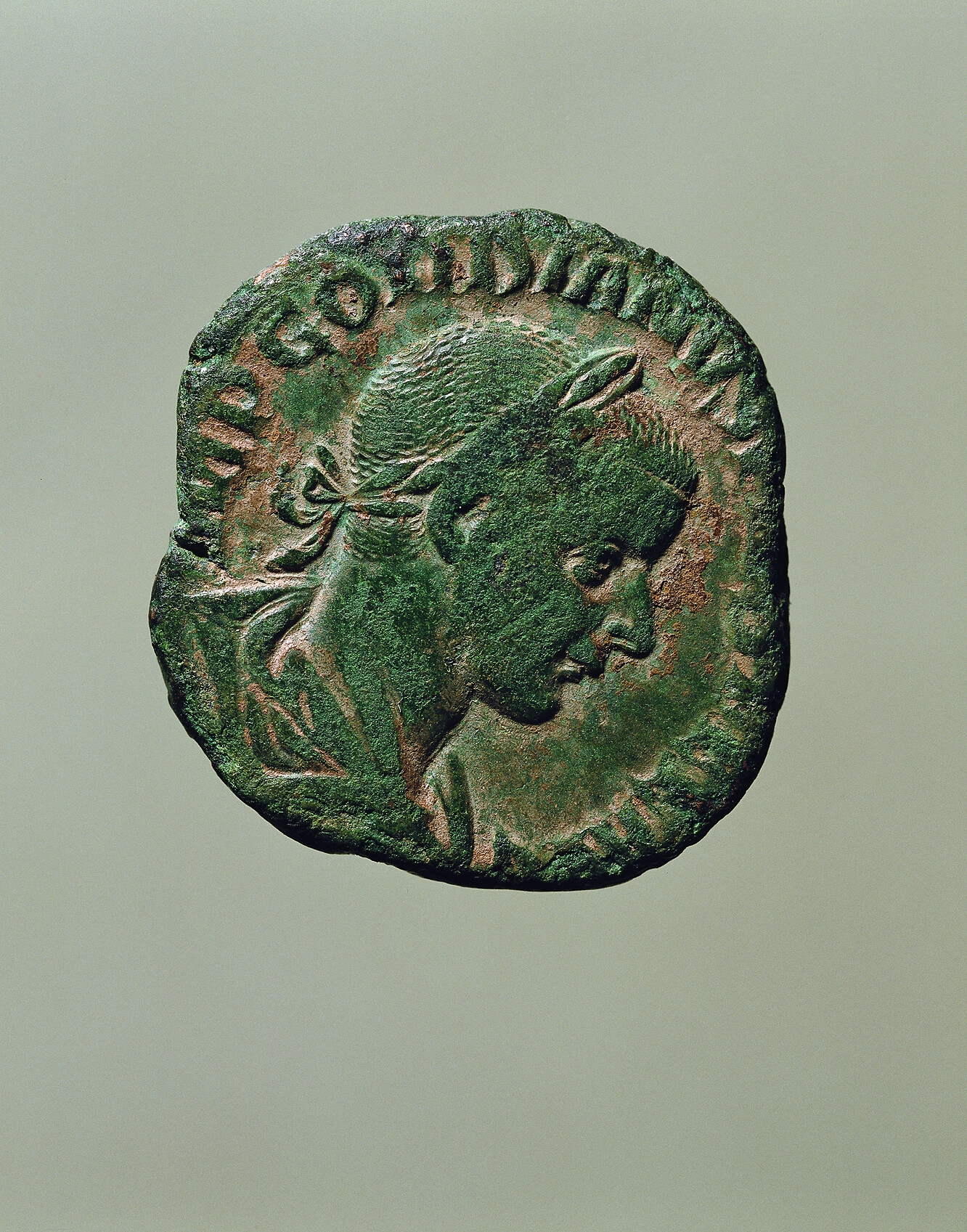 ronze coin of the Roman emperor Gordian III (238