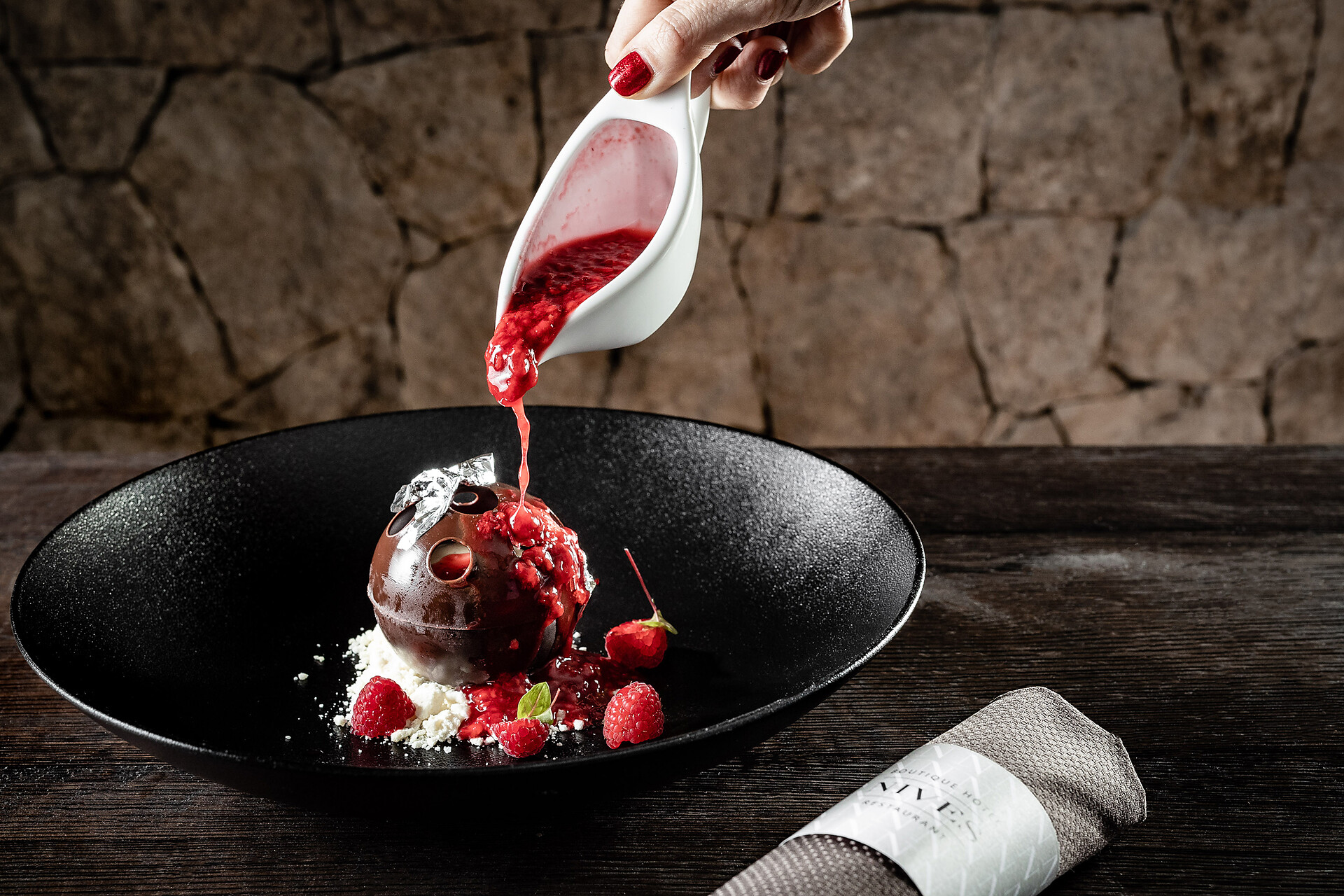 Icecream with warm raspberries