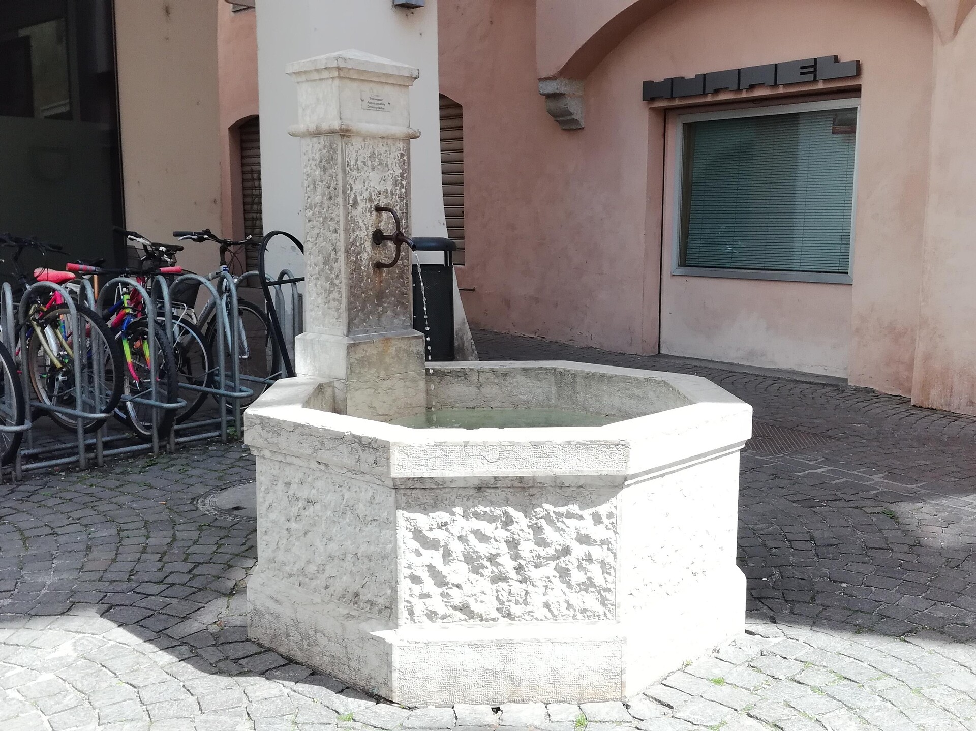 Fountain under the arcades