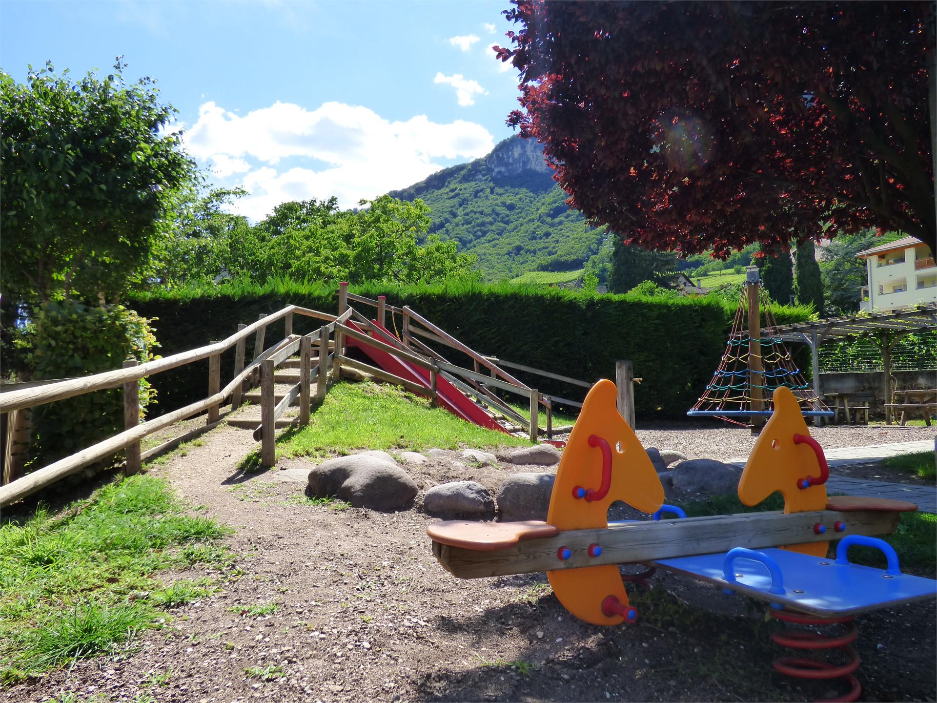 Children's playground next to the kindergarten Tramin an der Weinstraße/Termeno sulla Strada del Vino 1 suedtirol.info