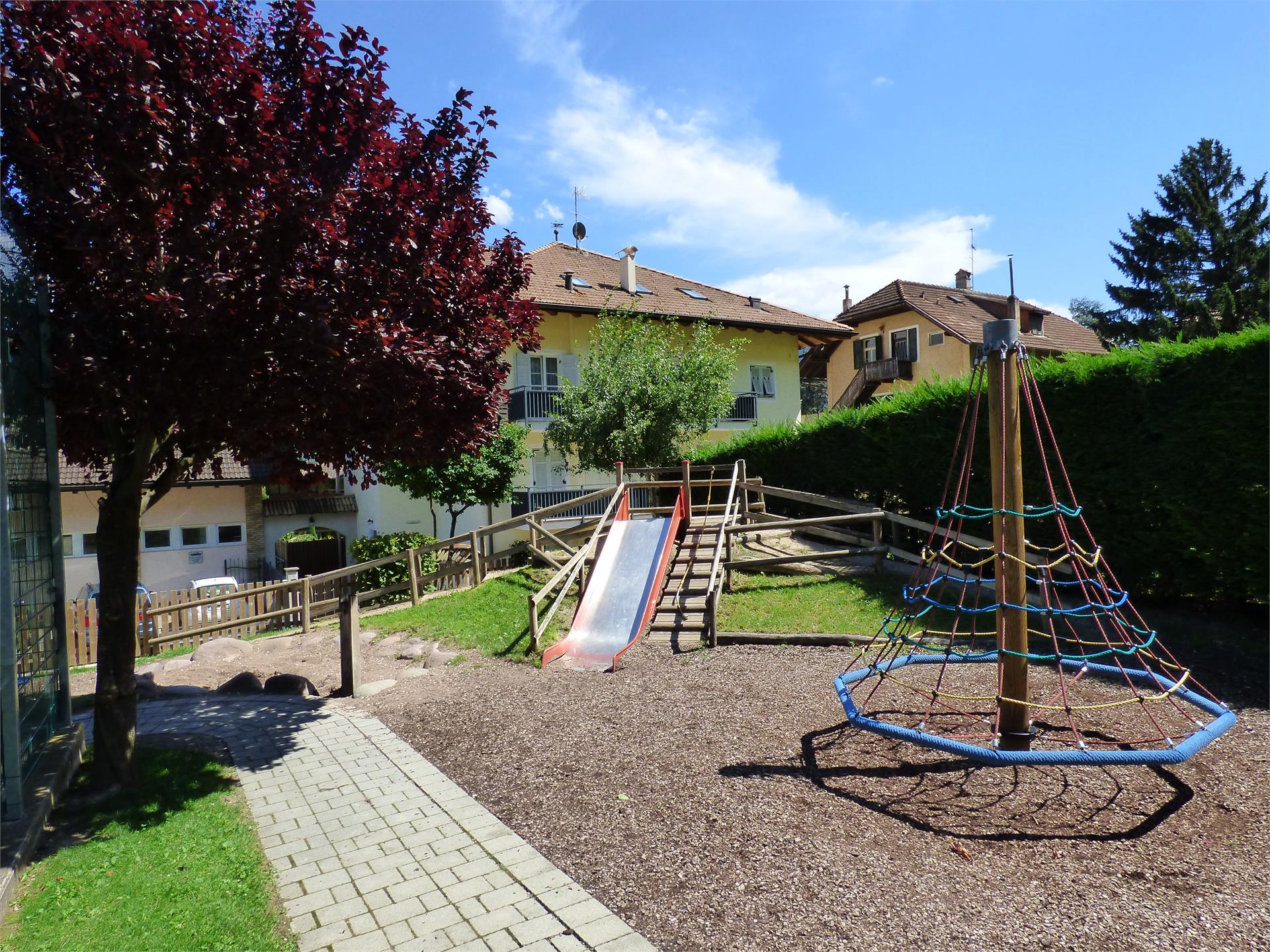 Children's playground next to the kindergarten Tramin an der Weinstraße/Termeno sulla Strada del Vino 3 suedtirol.info
