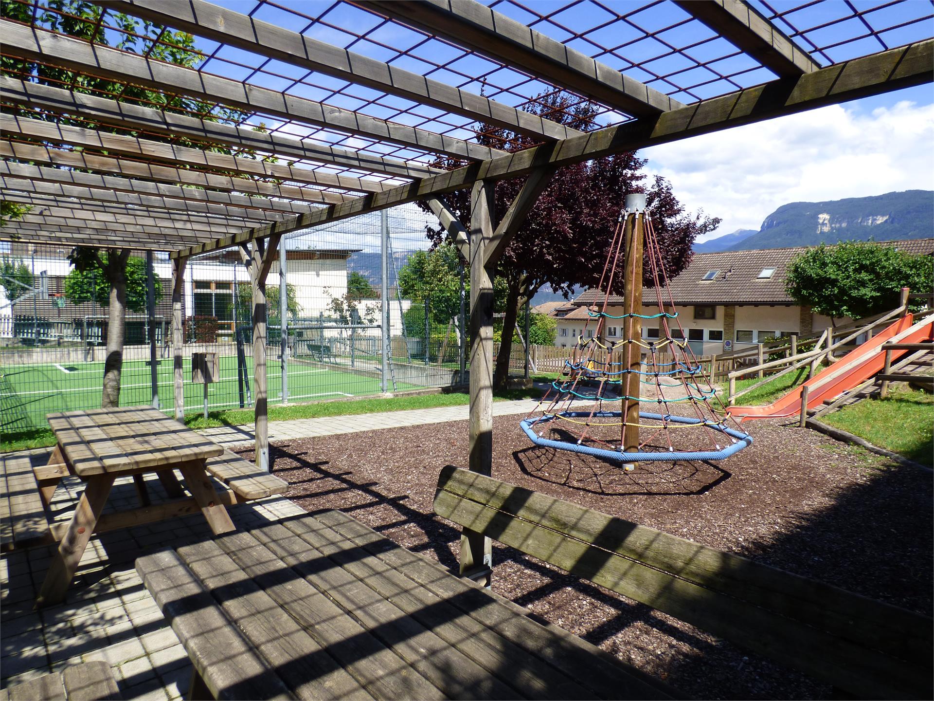 Children's playground next to the kindergarten Tramin an der Weinstraße/Termeno sulla Strada del Vino 2 suedtirol.info
